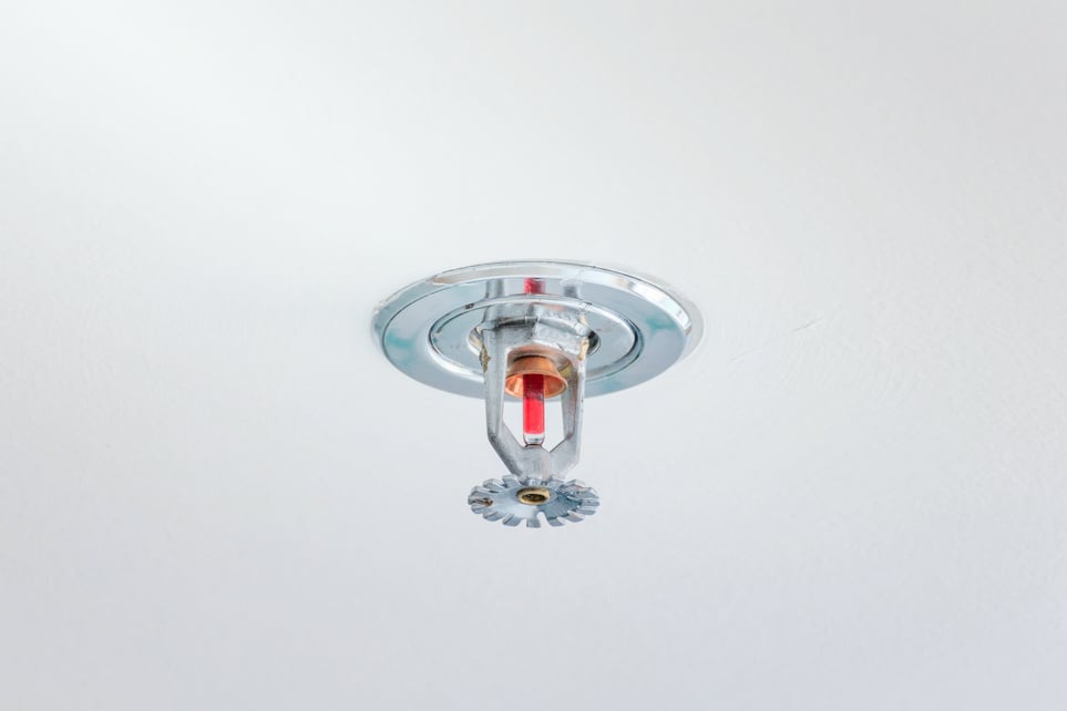 Close up Image of Fire Sprinkler on White Background. Fire Sprinklers Are Part of an Integrated Water Piping System Designed for Life and Fire Safety.